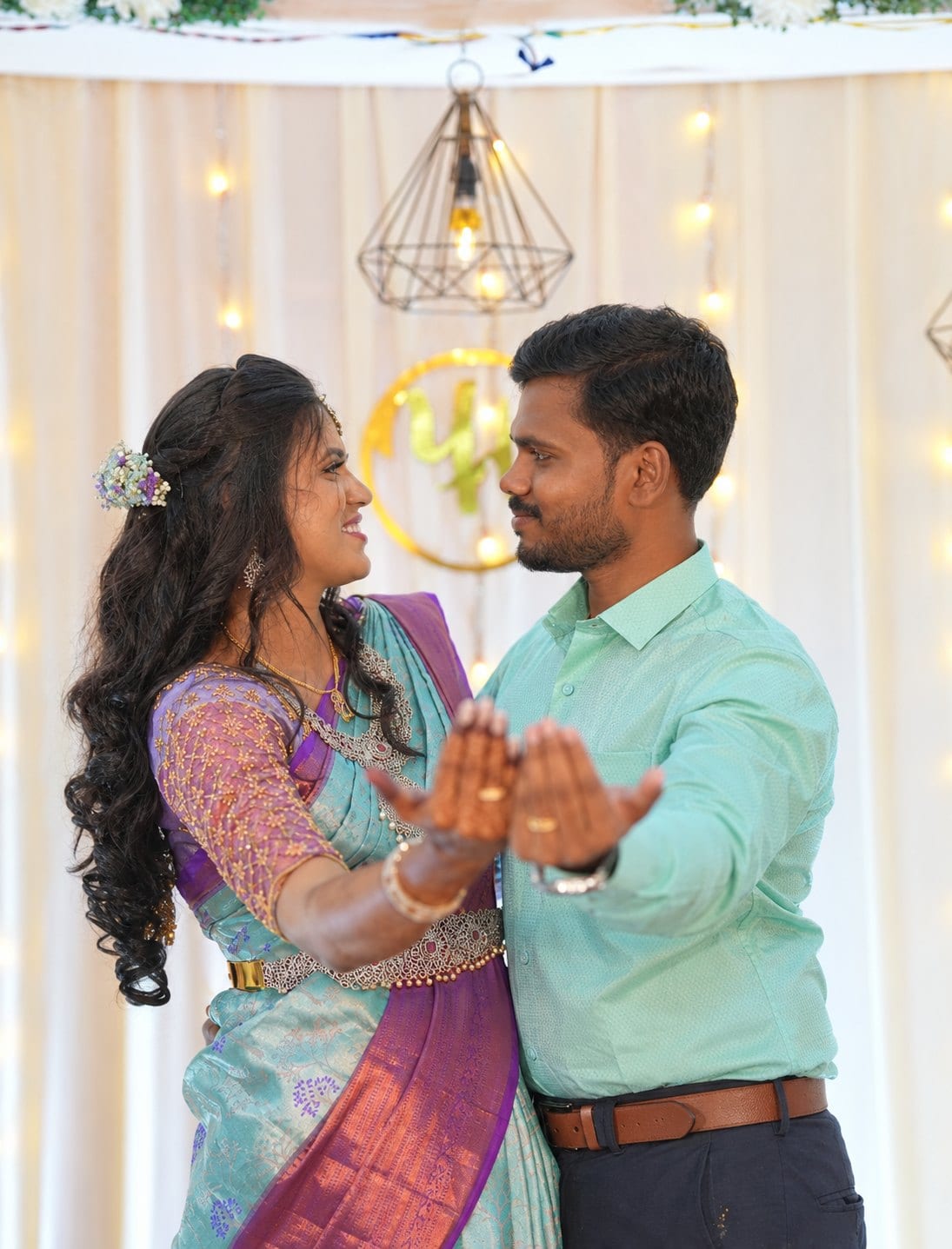 Yuvasriee and Yokesh, turned to each other, rings out to the camera