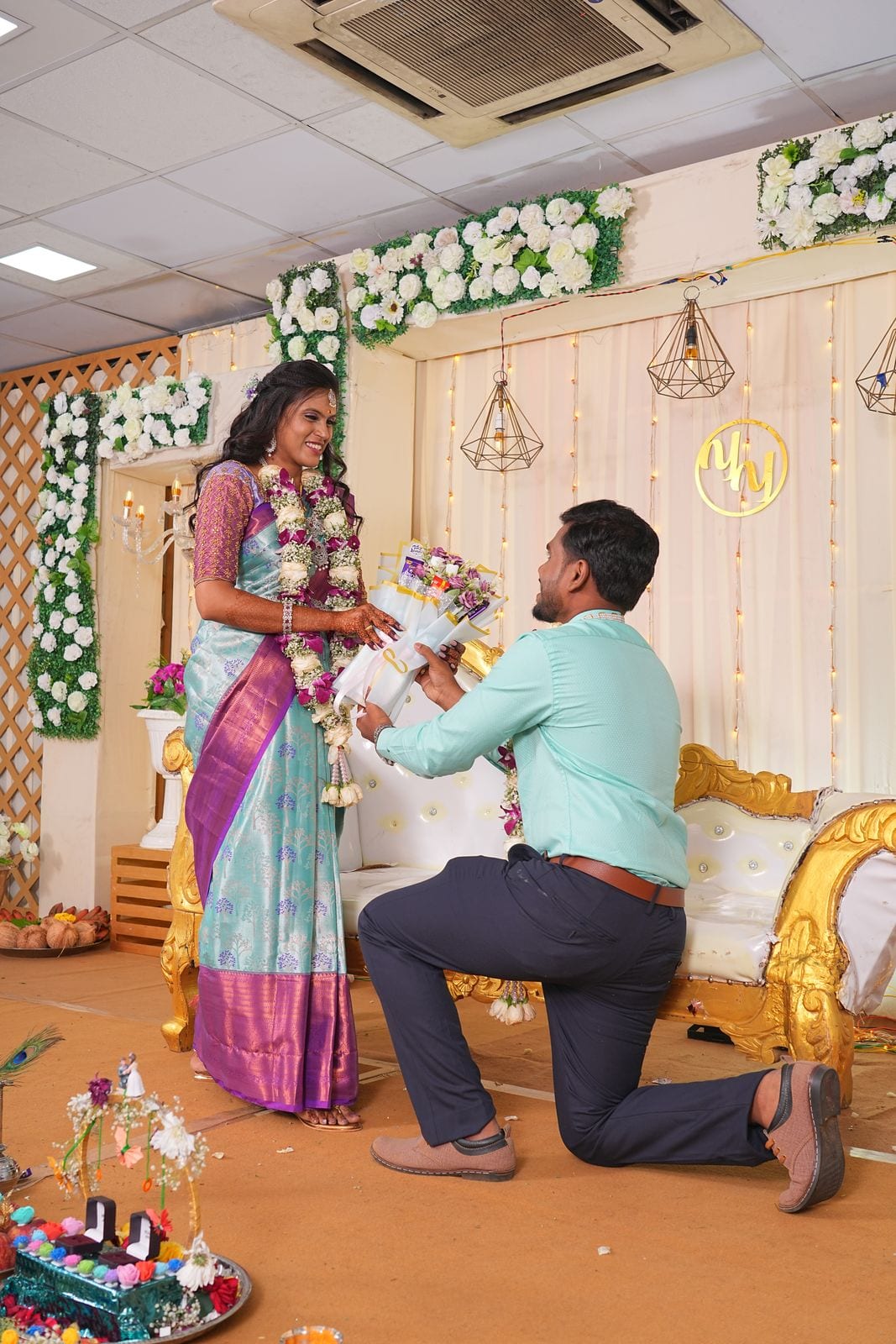 Yokesh on one knee, asking